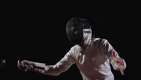 a fencer in action during a competition