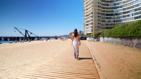 vina del mar landmarks, young girl, oceanside stroll, pristine sandy beach
