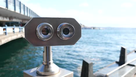 tourist binoculars by a bridge in istanbul, turkey