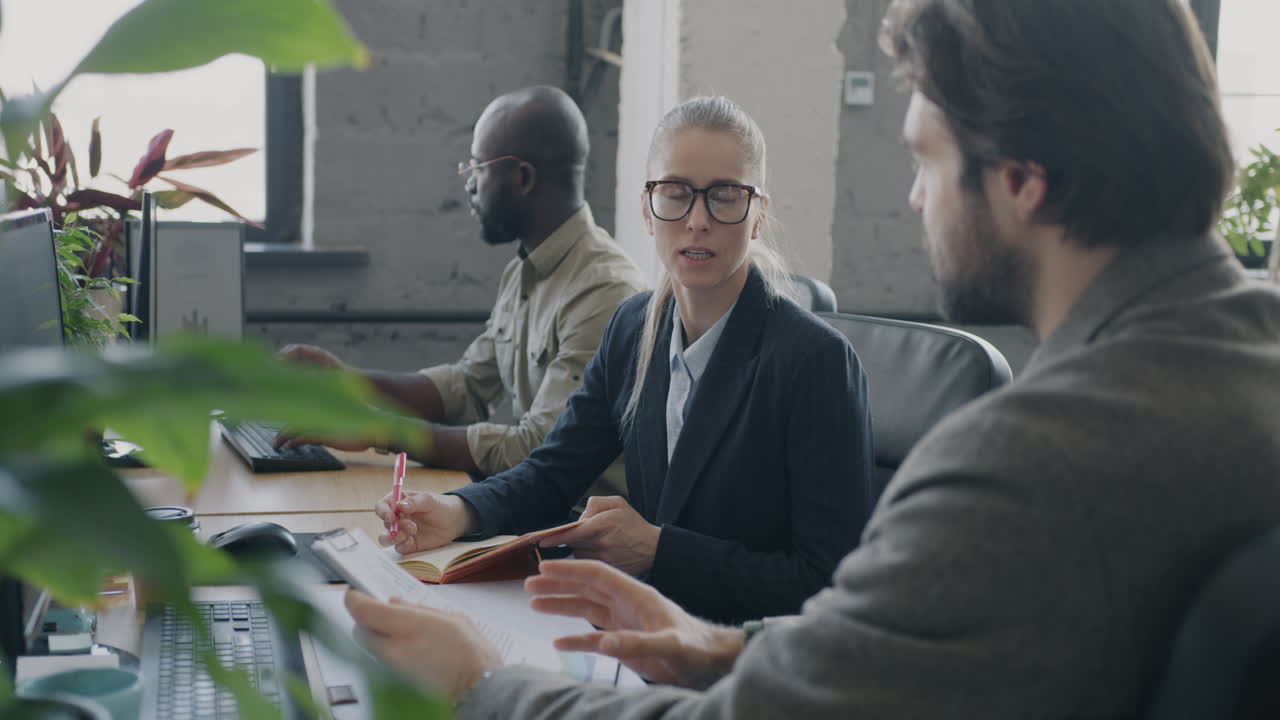 Business Team Collaboration in Modern Office Setting