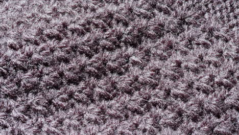 close-up of dark knitted fabric texture