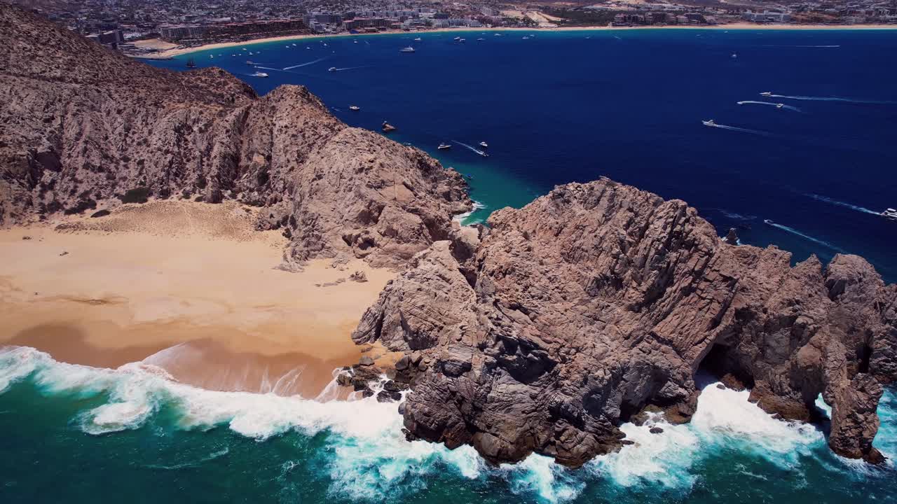Aerial footage of rugged coastal rock formations at Land’s End in Cabo San Lucas
