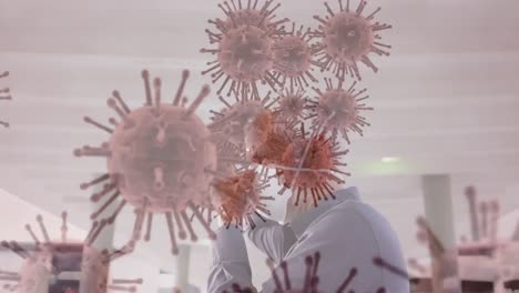 Animation-of-covid-19-cells-moving-over-man-in-face-mask