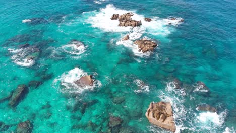 aerial view of anse marron with its famous granite rock formations and natural pools