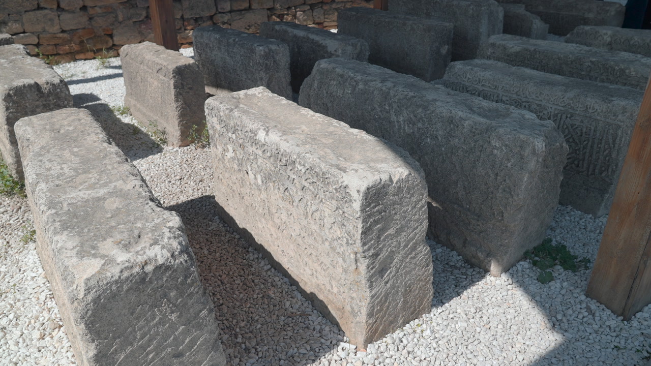 Weathered Stone Blocks Arranged Outdoors In Sunlit Conservation Yard, Rows Of Rectangular Limestone Slabs Set. Creative