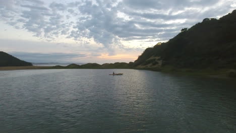 ocean kayaking at sunrise along coast of south africa leisure sport