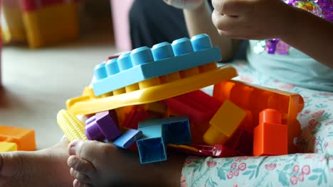 Ful-building-blocks-on-wooden-table,-close-up