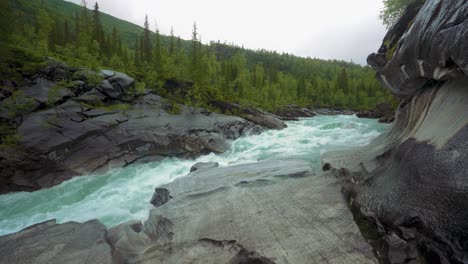 marmorslottet marmorfossen river in mo i rana, northern norway. marble stone carved by water. nature