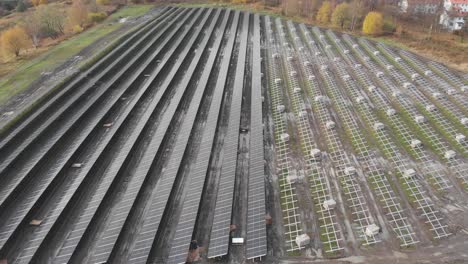 aerial pullback over a solar farm as it's being built
