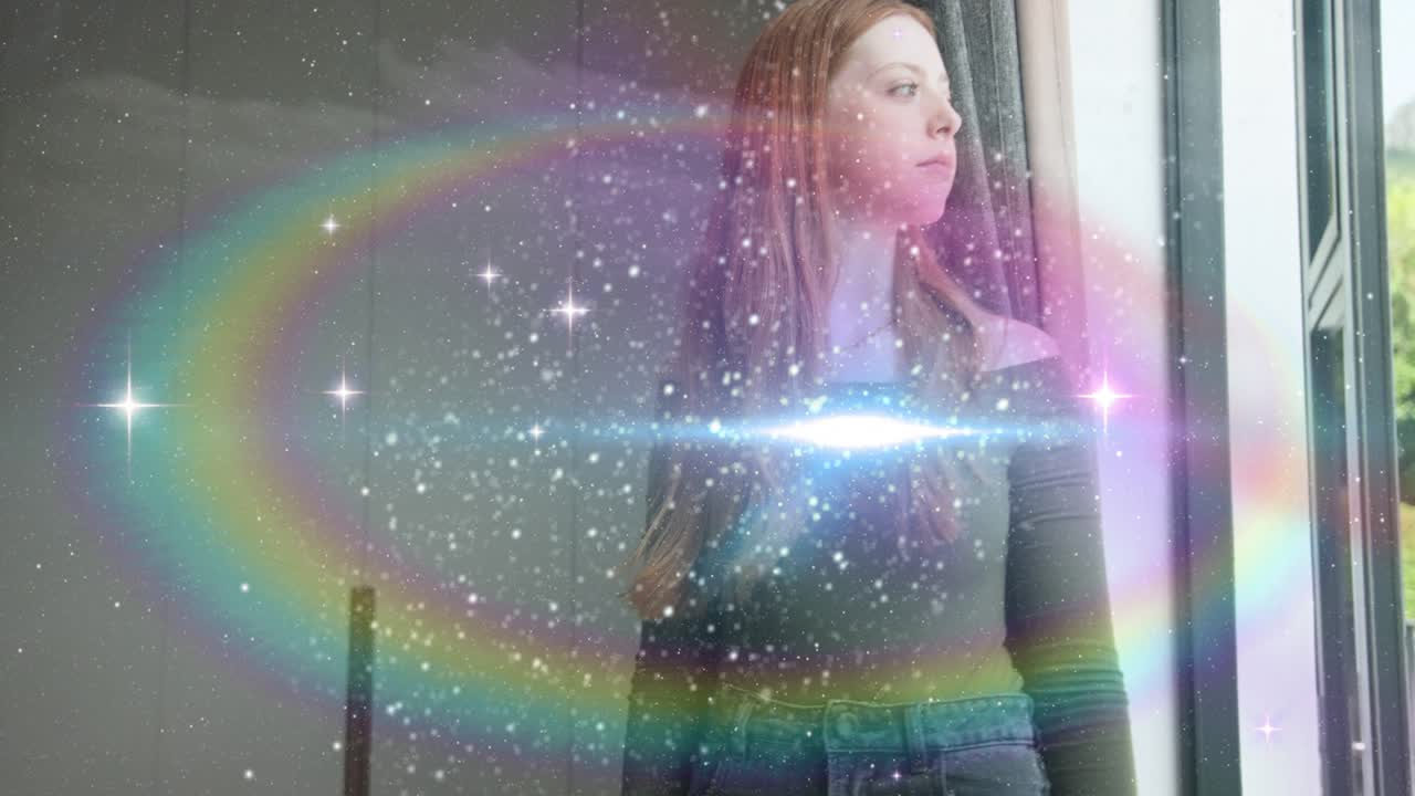 Woman stepping into frame causing purple nebula sweep forming rainbow ring on chest for tech demo