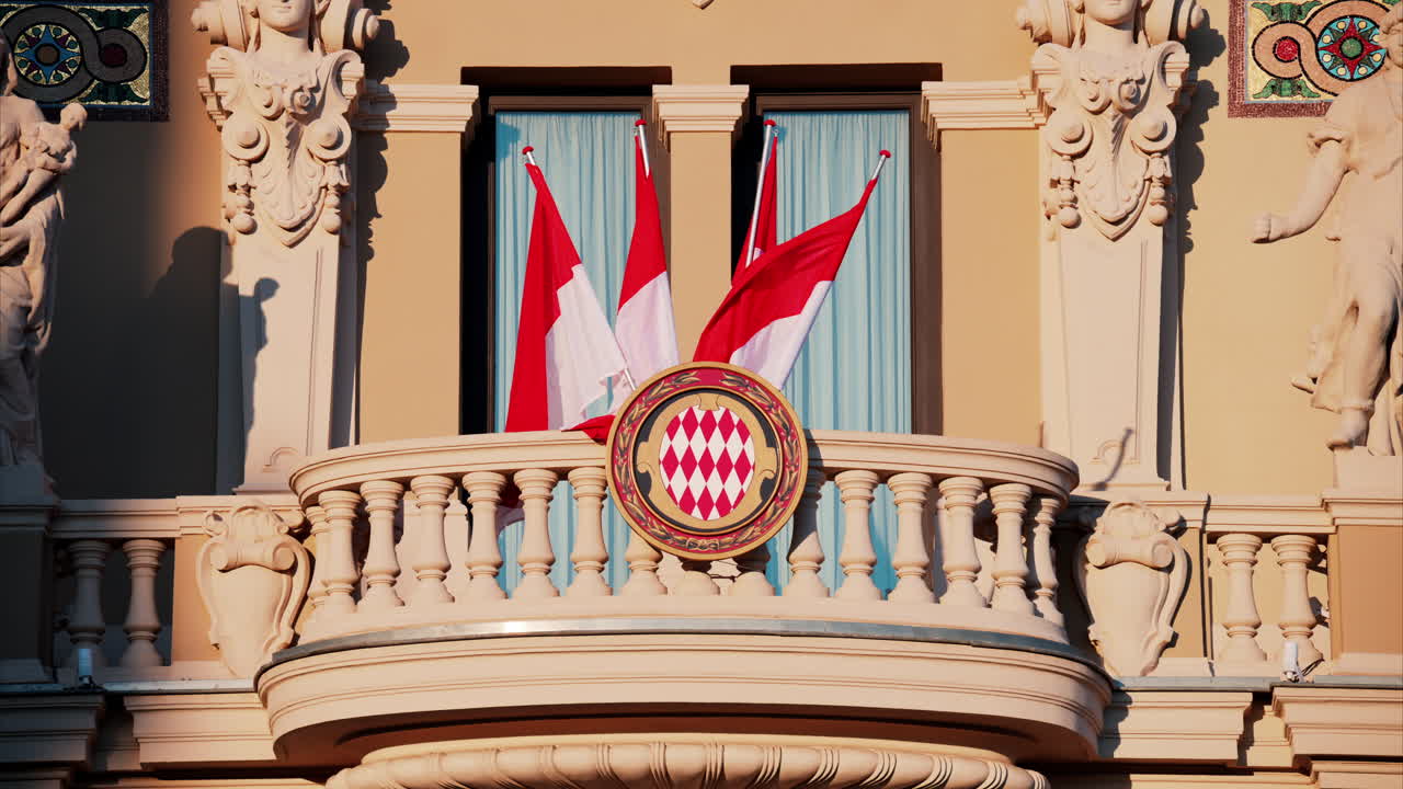 Monte Carlo, Monaco - October 24, 2024: The coat of arms of Monaco and multiple flags waving on the Monte Carlo Casino