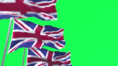 three national flag of the united kingdom flying in the wind.