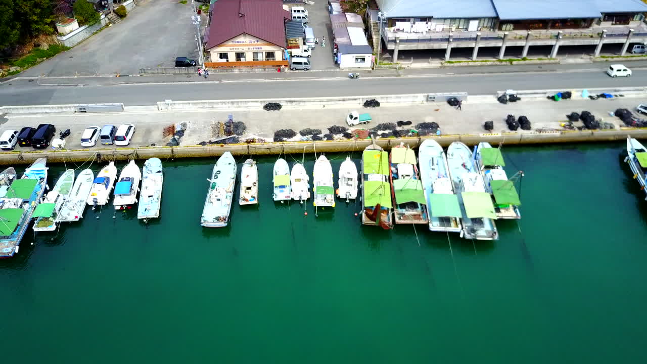 Aerial View of a Japanese Fishing Harbor with Docked Boats