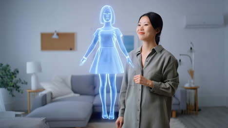 woman interacting with a holographic virtual assistant