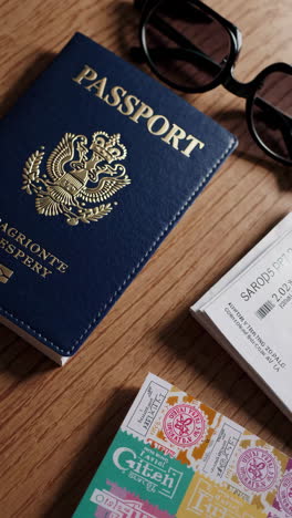travel essentials on a wooden table
