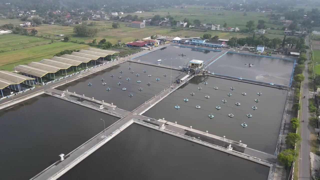 Aerial footage of the Wastewater Treatment Plant in Bantul, Yogyakarta. Its purpose is to prevent water and soil pollution, protect human health, and preserve aquatic ecosystems, allowing for reproces