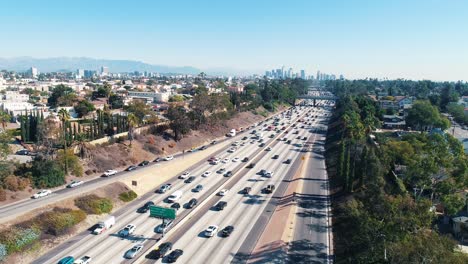 aerial los angeles freeway traffic driving california city drone