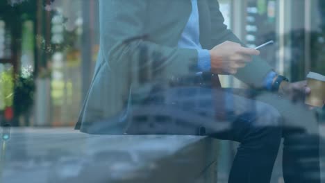 digital composition of mid section of man using smartphone against city traffic