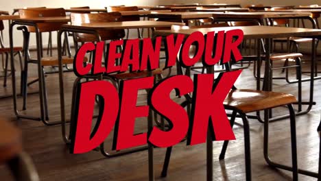 Animation-of-clean-your-desk-text-over-empty-classroom