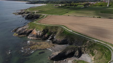 Irish-coastline-walking-trail-in-Donabate-with-a-round-tower