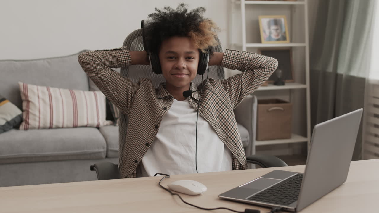 Boy Leaning Back after Playing Videogame