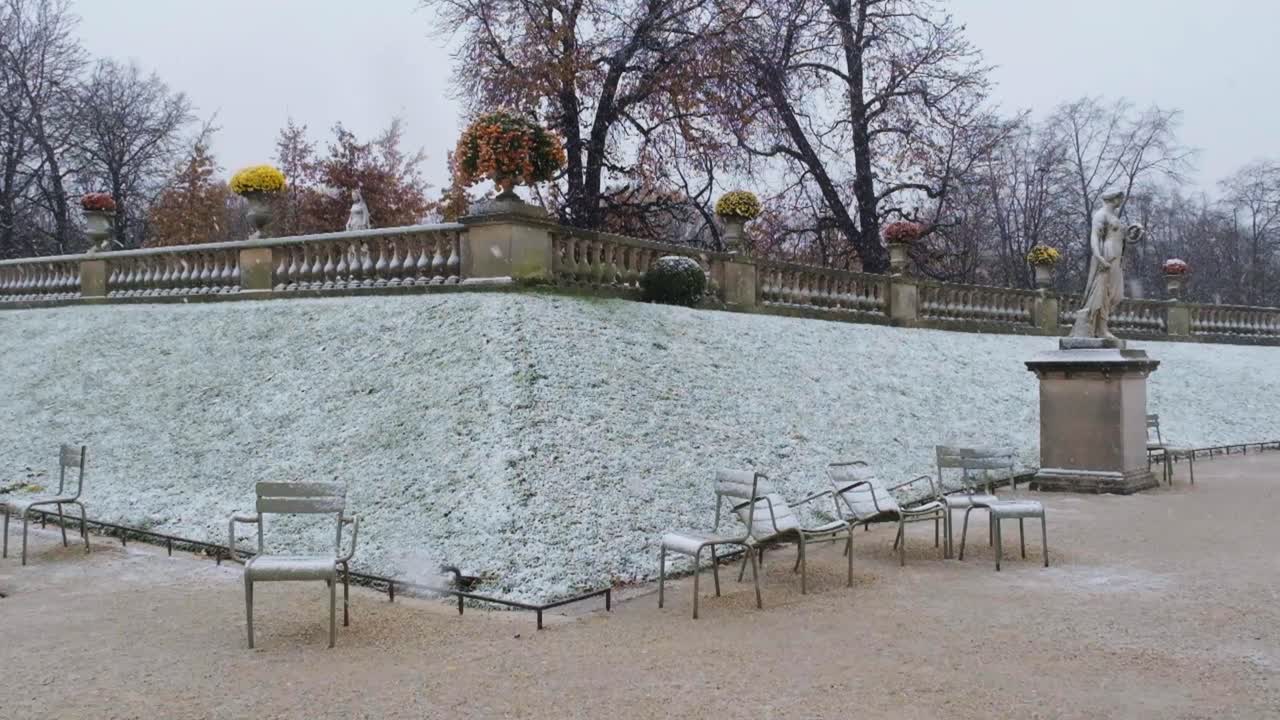 Slow-motion shot of Luxembourg Gardens Under Snowfall