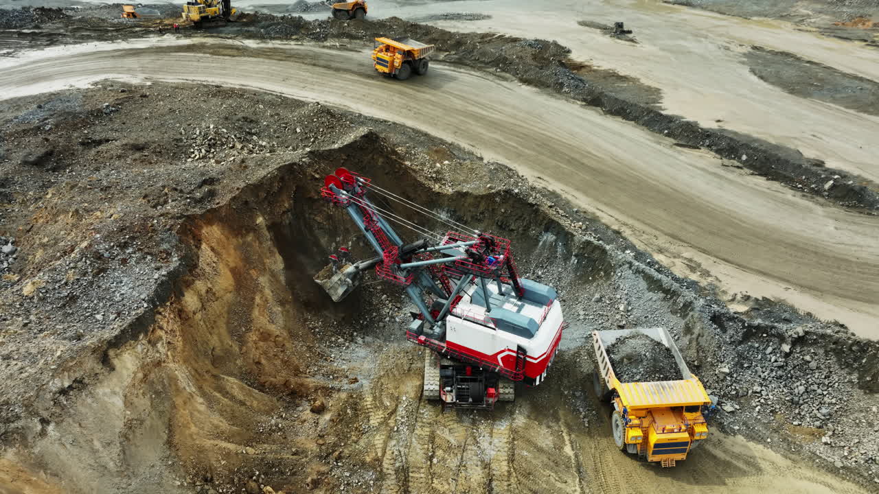 Open Pit Mining Operation with Excavator and Dump Truck