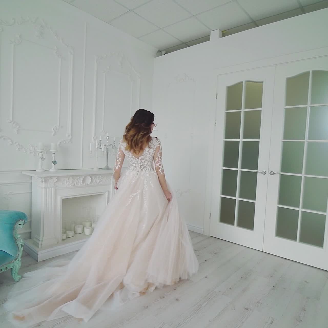 Bride in interior of large bright room