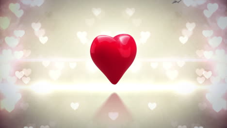 corazón rojo girando y explotando en un fondo brillante