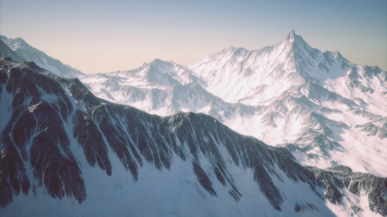Majestic snow covered peaks reveal natures breathtaking artistry at dawn