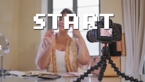 animation of start text over caucasian woman making vlog using camera