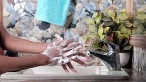 washing hands in a bathroom