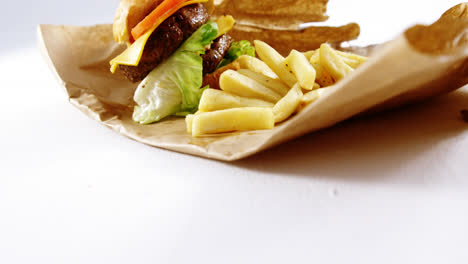 Hamburger-and-french-fries-on-table