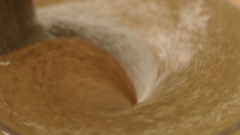 Mixing-Coffee-Powder-And-Water-In-A-Self-Stirring-Mug