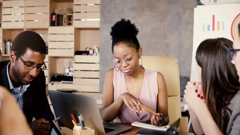 african american woman manager at office meeting. happy multiethnic colleagues discuss modern market tendencies. 4k