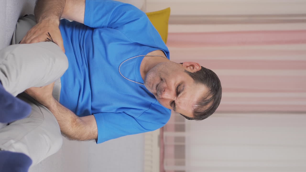 Vertical video of Tired And Sleepy Man.