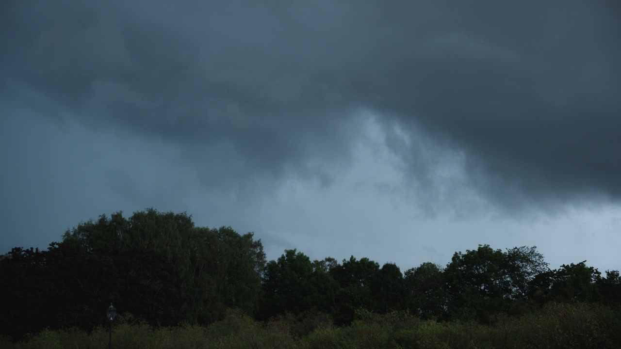 Moody clouds that gives a sense of fear, anxiety and intense horror. It looks like a thunderstorm is coming around soon