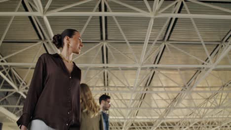 people walking through airport terminal