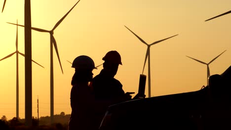 male engineers are talking about wind turbine system technician woman