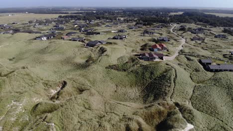 Dunes-and-coastal-houses-in-Løkken,-Denmark