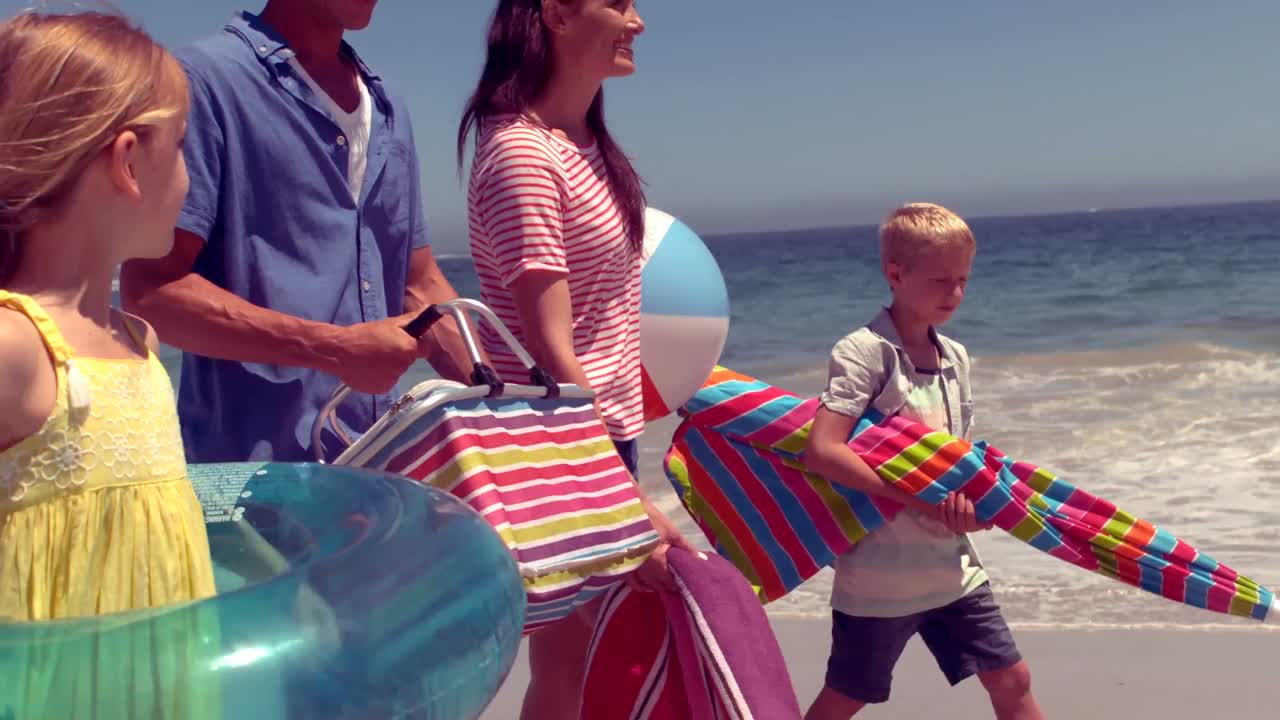 Happy family posing with buoys
