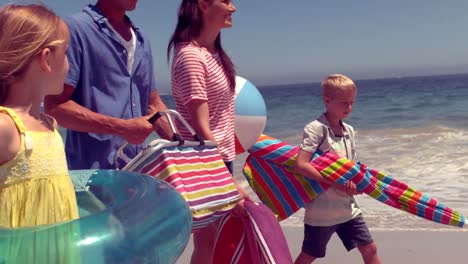 happy family posing with buoys