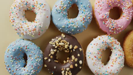 video of donuts with icing on white background