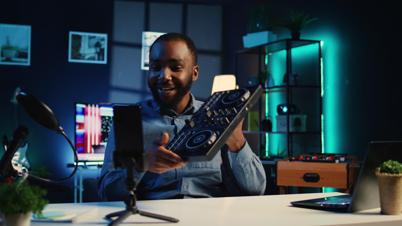 Artist films DJ tutorial in apartment