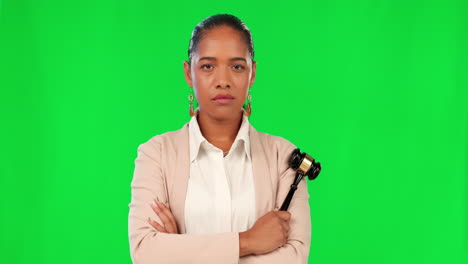 serious, face and female judge with a gavel
