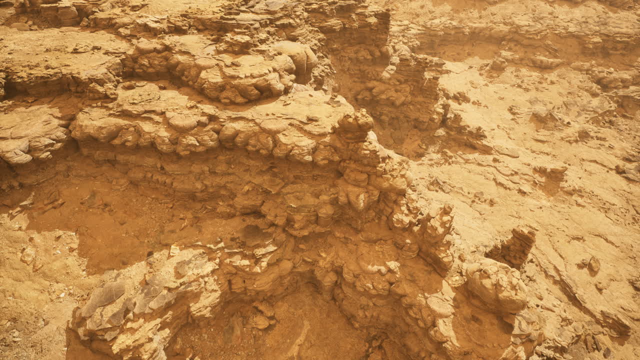 Unique rocky formations displayed within a vast desert landscape