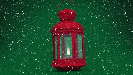 animación de nieve cayendo sobre linterna roja sobre fondo verde