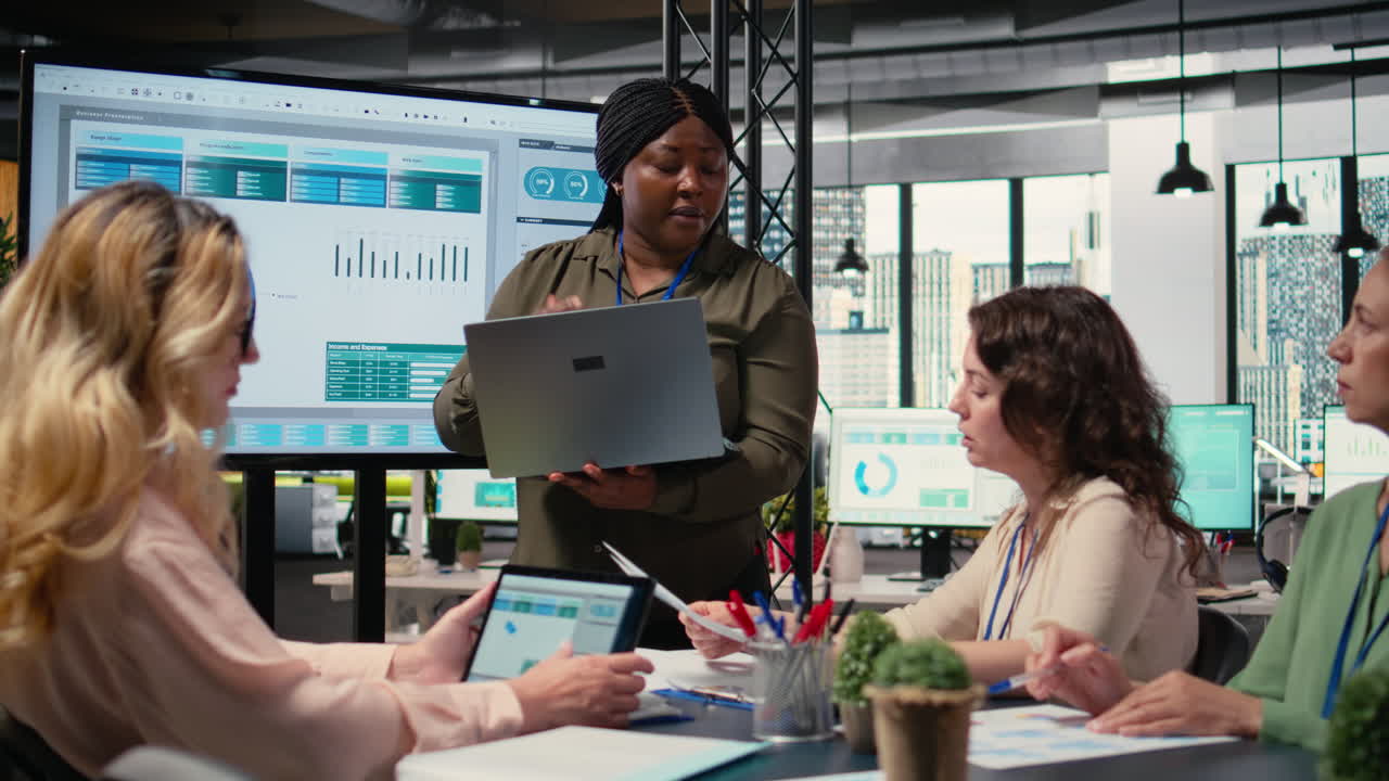 Vertical Video African american woman pitching her ideas with the colleagues team