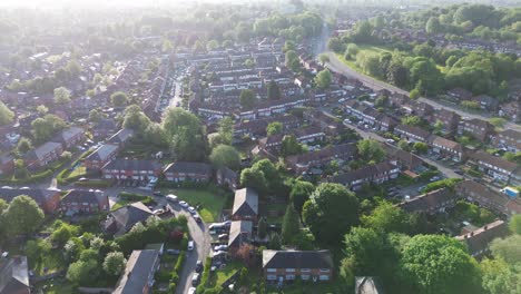 4k aerial shot of typical british houses from above in the morning and housing crisis