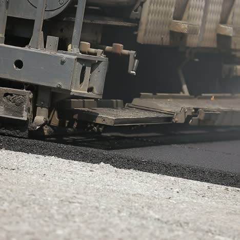 road roller laying a new asphalt